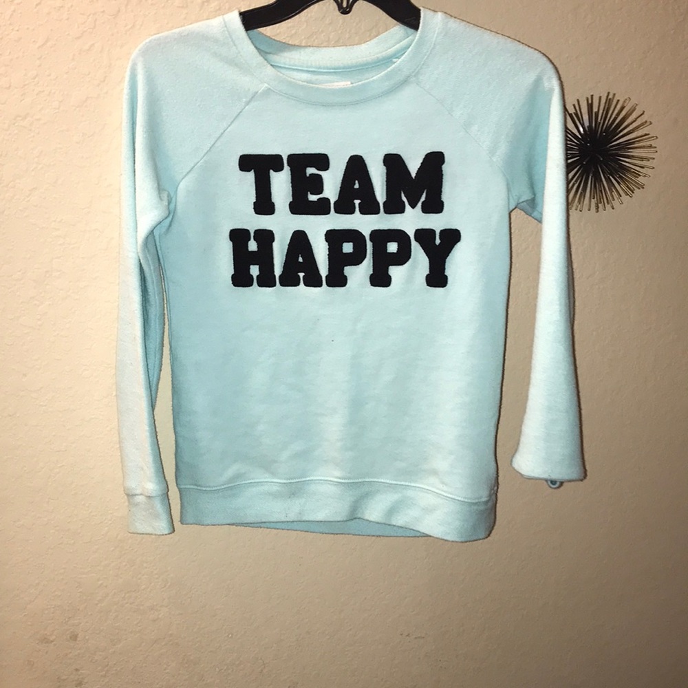 A long sleeve sweater.